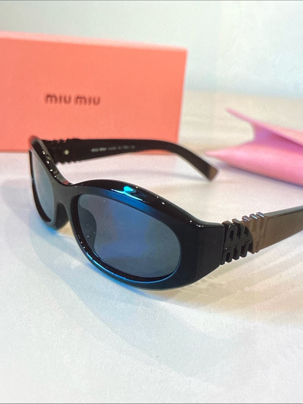 Miu Miu Oval Wrap Sunglasses Glossy Black Blue Temple Fashion Shades